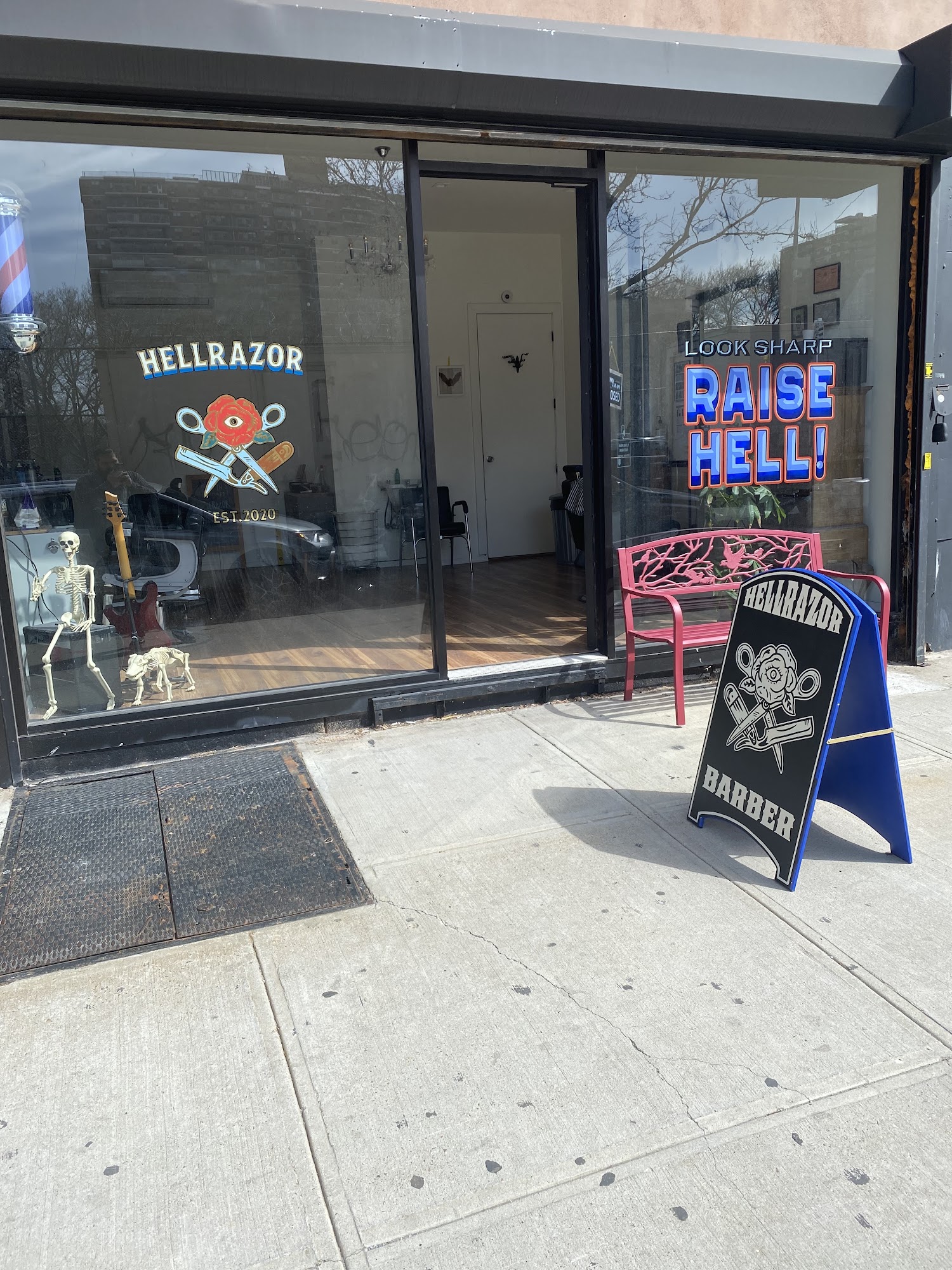 HellRazor Barbershop window with Raise Hell decal